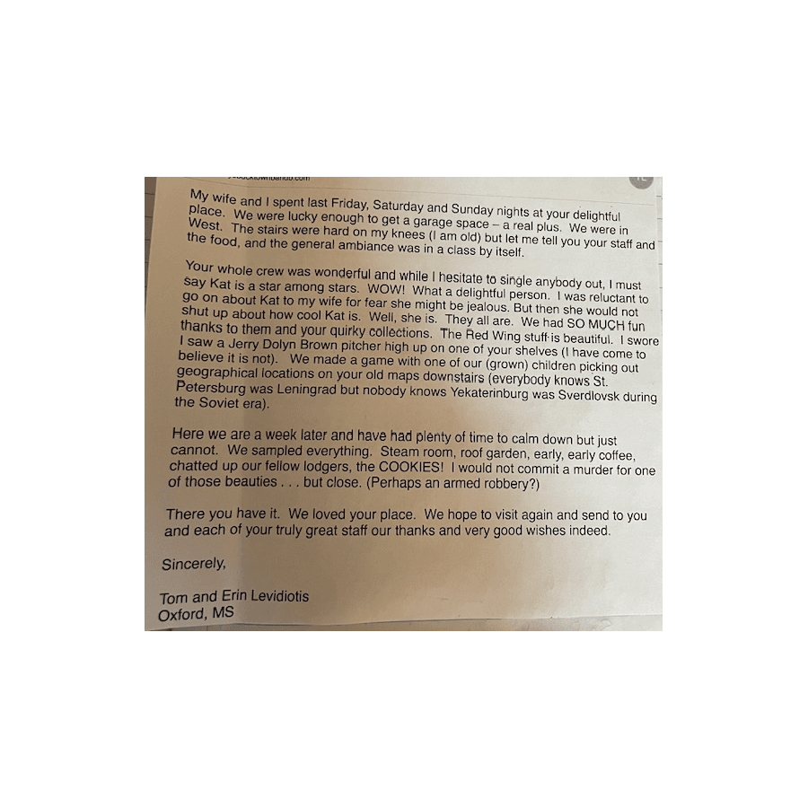 A handwritten thank-you letter from Tom and Erin Levidiotis expressing appreciation for their stay and the staff at a delightful location.