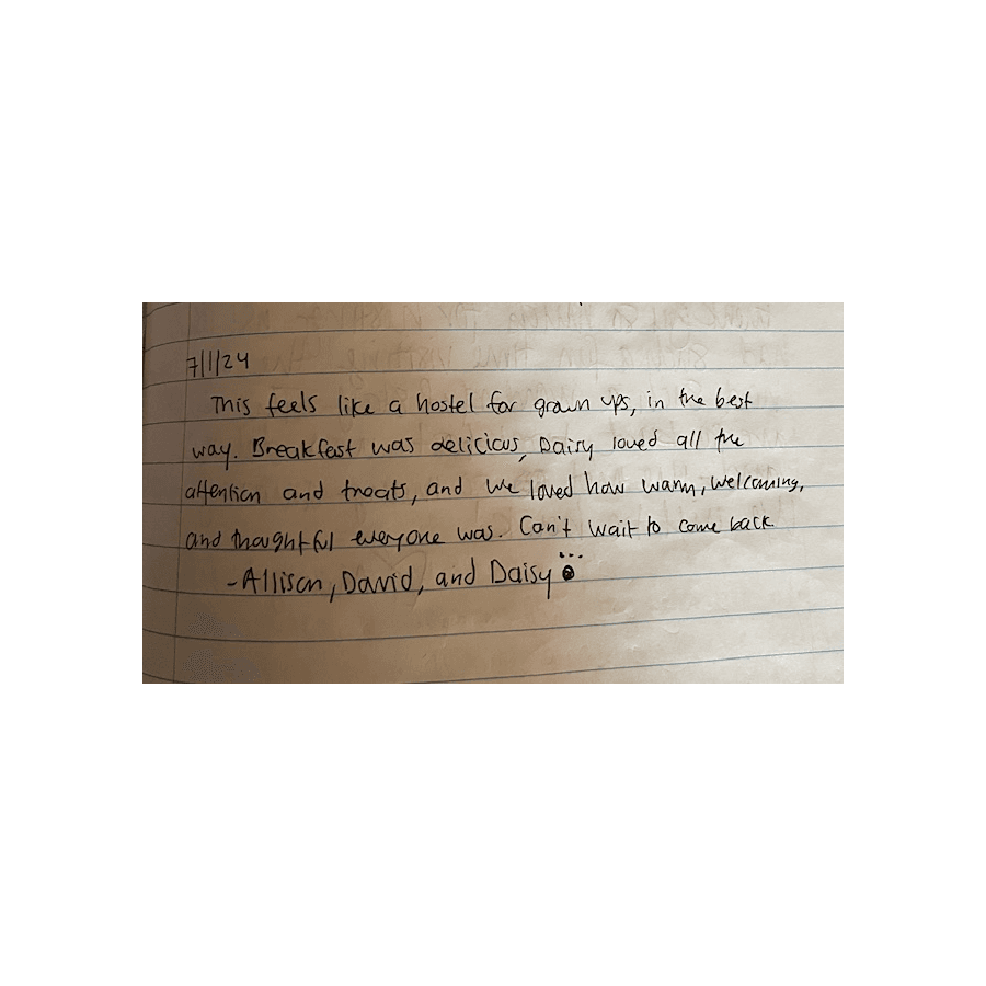 A handwritten note expressing gratitude for a hostel-like experience and mentioning a pet.